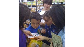During a field trip to a local grocery store, participants compare nutrition labels to find the snack with the most fiber