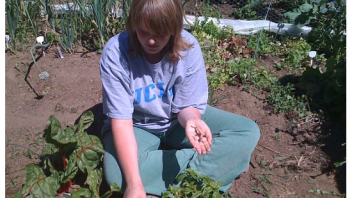 One participant helped find "bad" bugs in the garden so they wouldn't eat the veggies