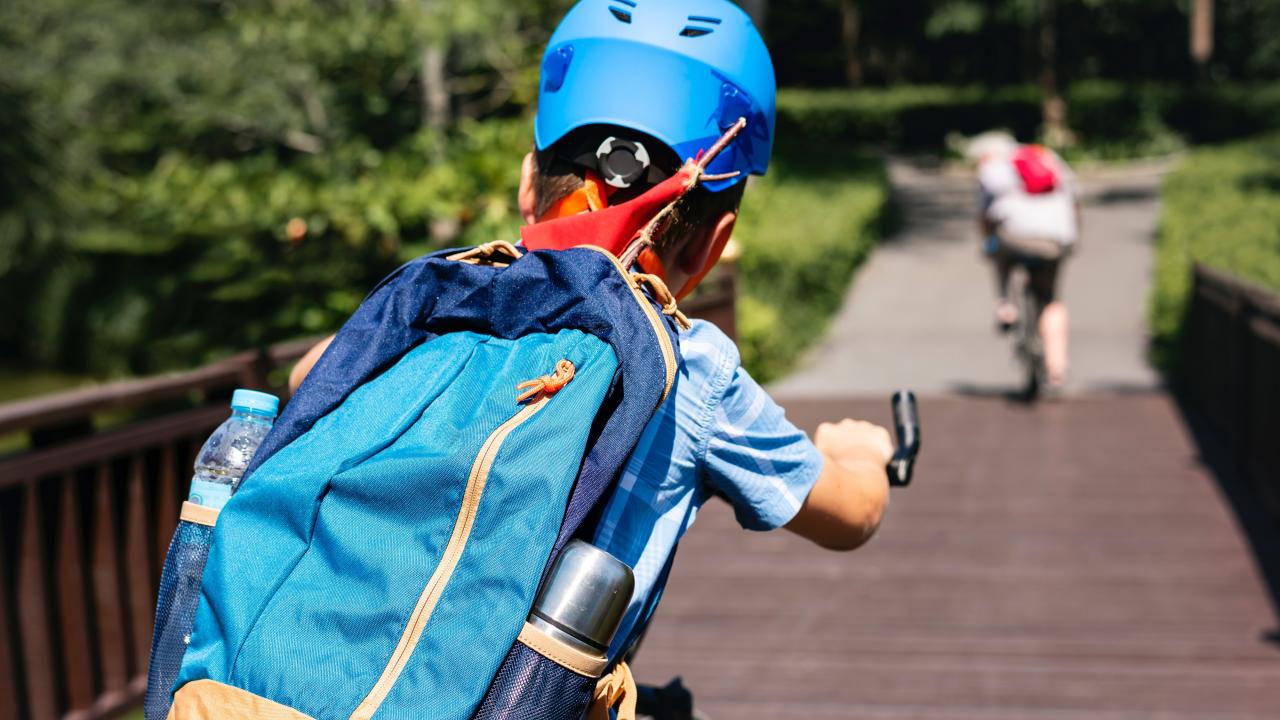 child on bike