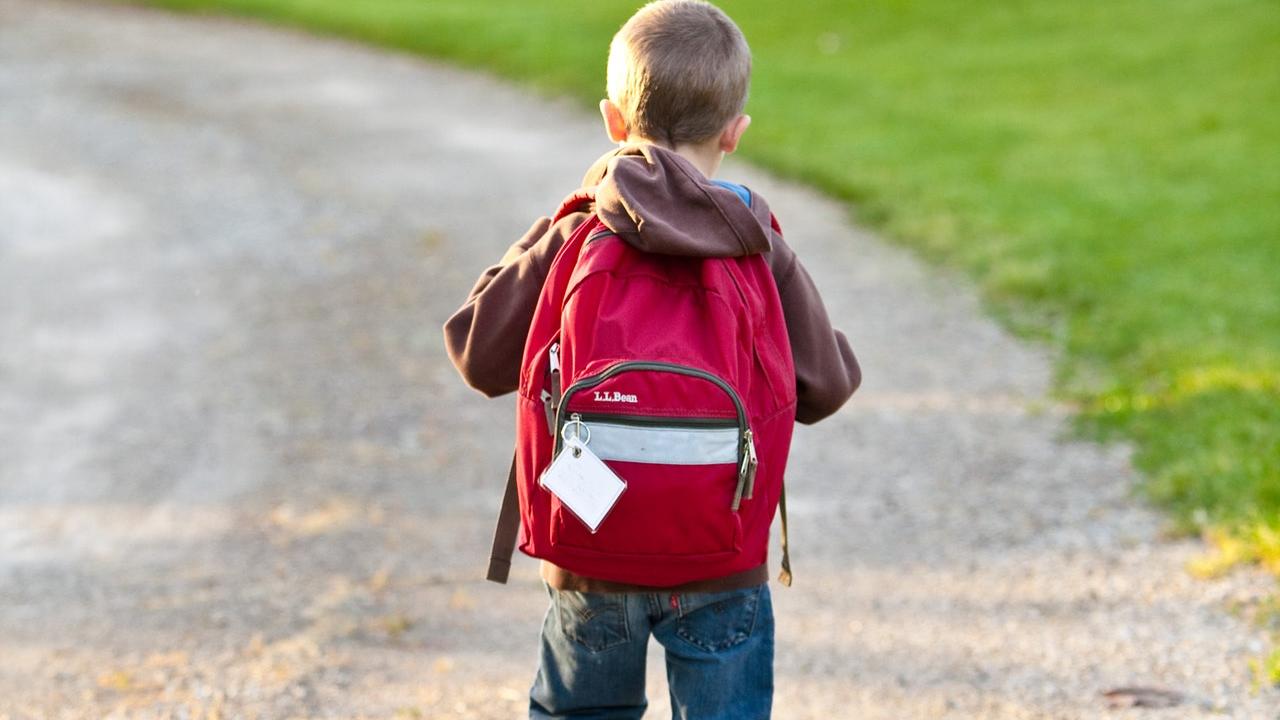 kid walking to school
