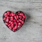pomegranate seeds in the shape of a heart 