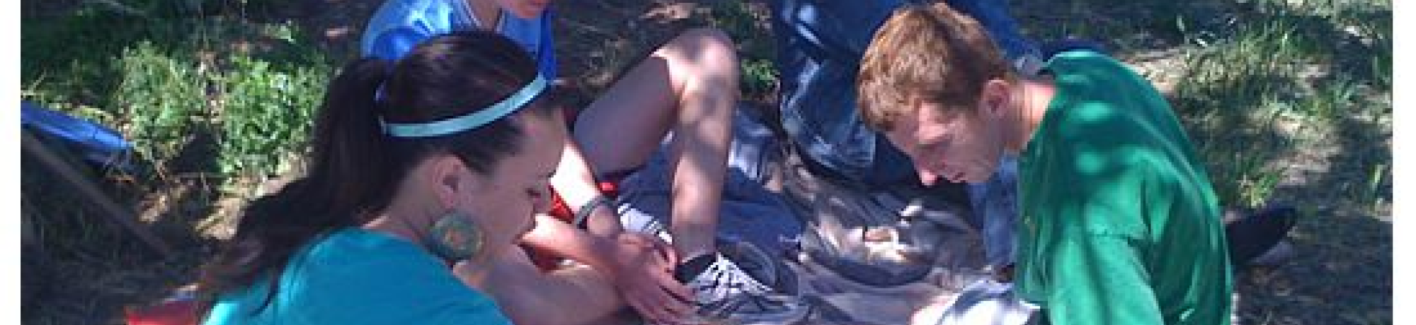 In the garden, participants sat in the shade and learned about the Food Guide Pyramid